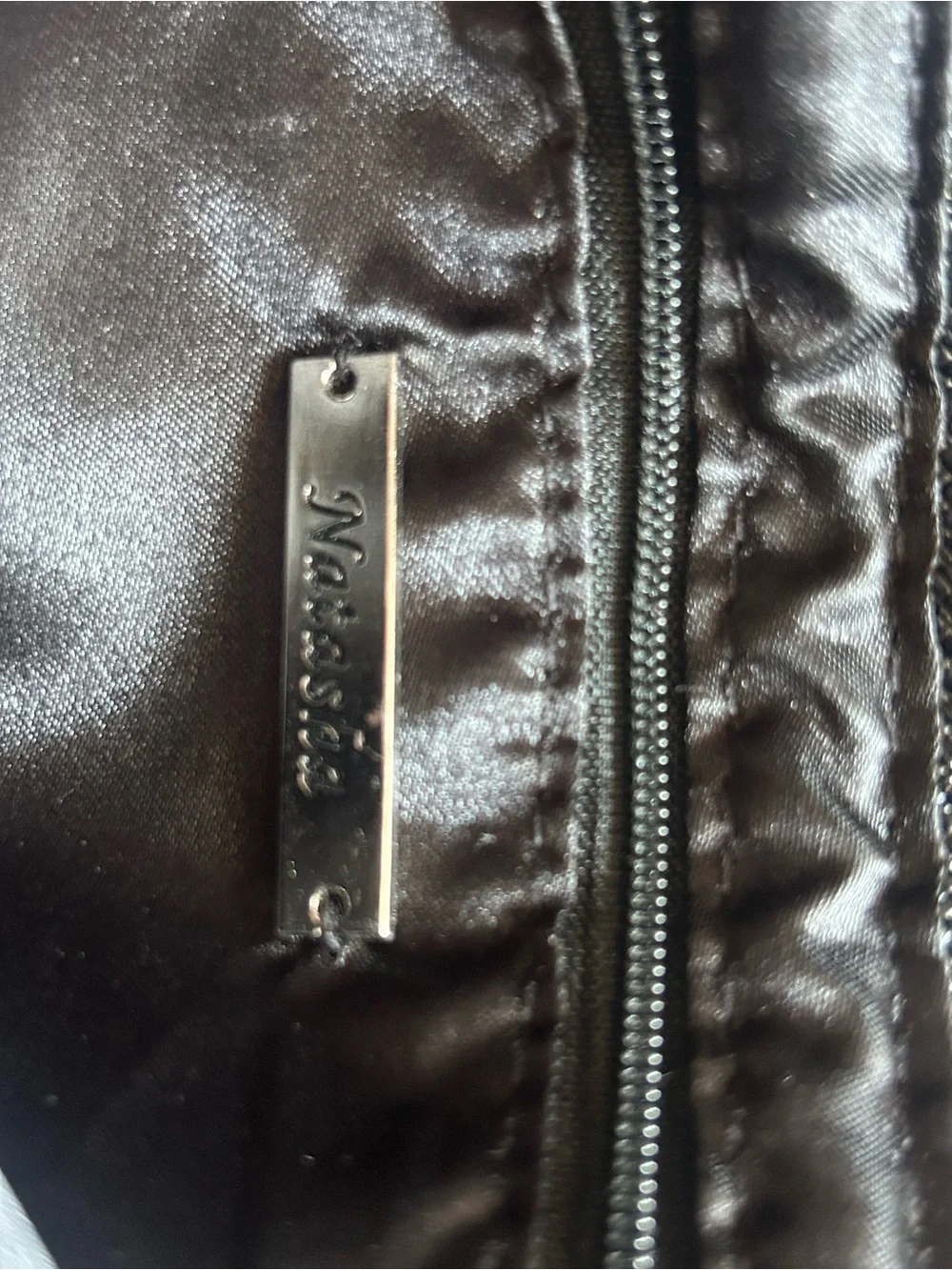 Natasha Couture Black Satin Wristlet with Metal Logo